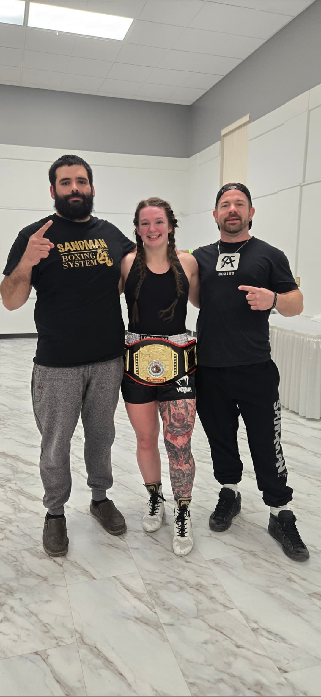 Cole Smith with champion fighter after training
